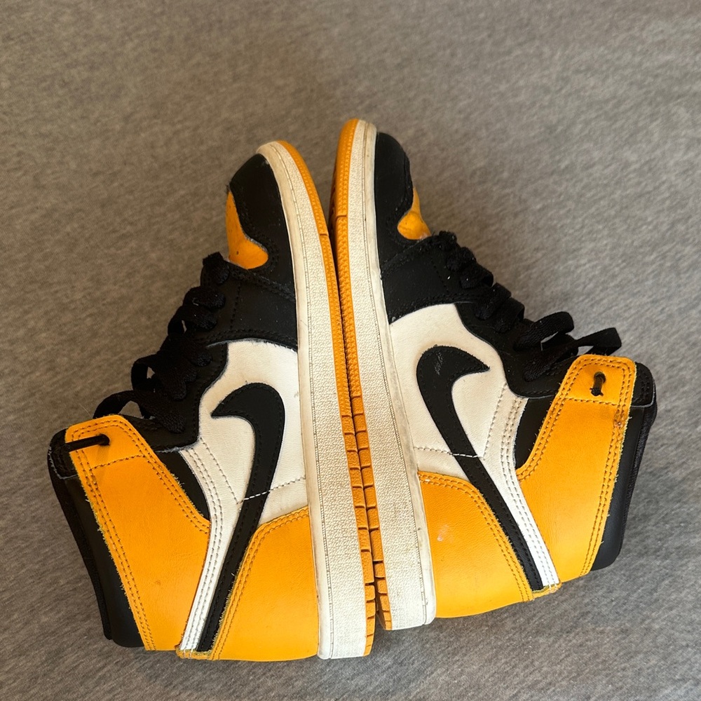 Nike Air Jordan Retro High Tops in Black, White, and Orange - Picture 2 of 11